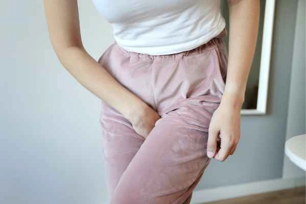 woman running for the toilet because of urinary incontinence Stowmarket